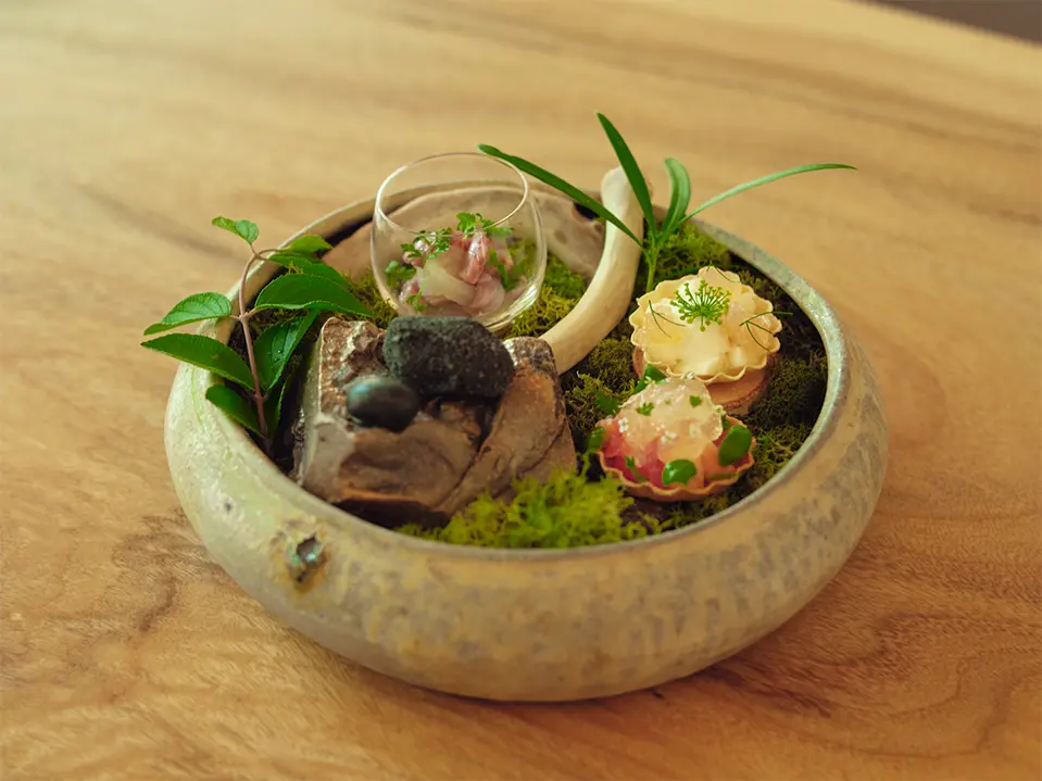 Chilled soup with vegetables from our own garden, local vegetables, sencha green tea and bonito broth.